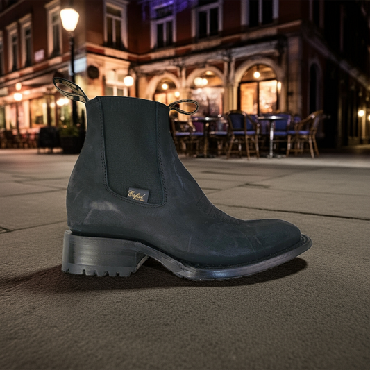 Bota Chelsea negra para mujer, piel nobuk, punta francesa cuadrada y suela de cuero con tacos.